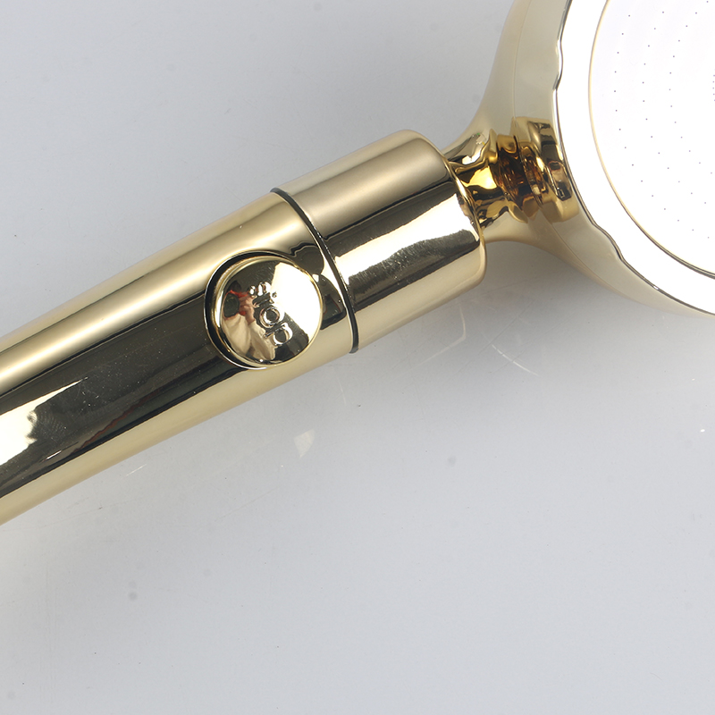 Pomme de douche japonaise en or